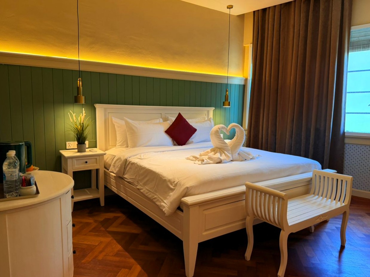 Deluxe boutique room with wood flooring at The Chambers Hotel Penang